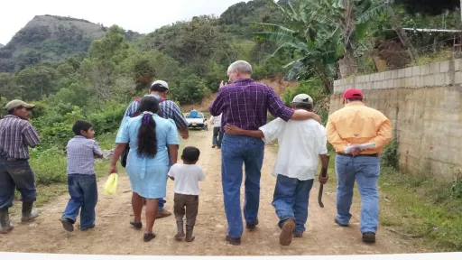 people walking together in rural area