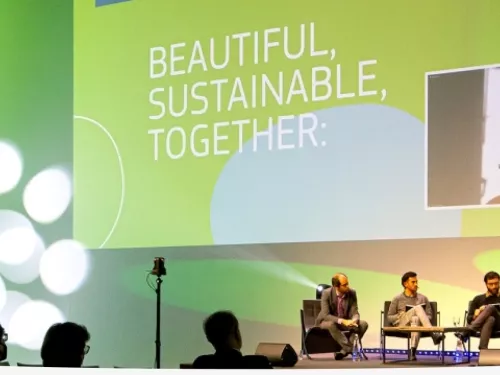 people at an event in green